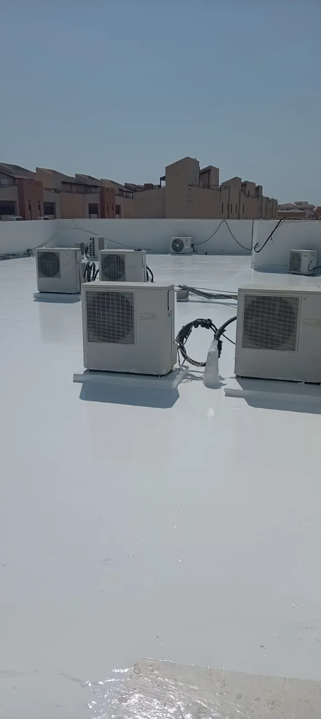 Completed roof: Finished reflective coating around AC plinths and cable runs.