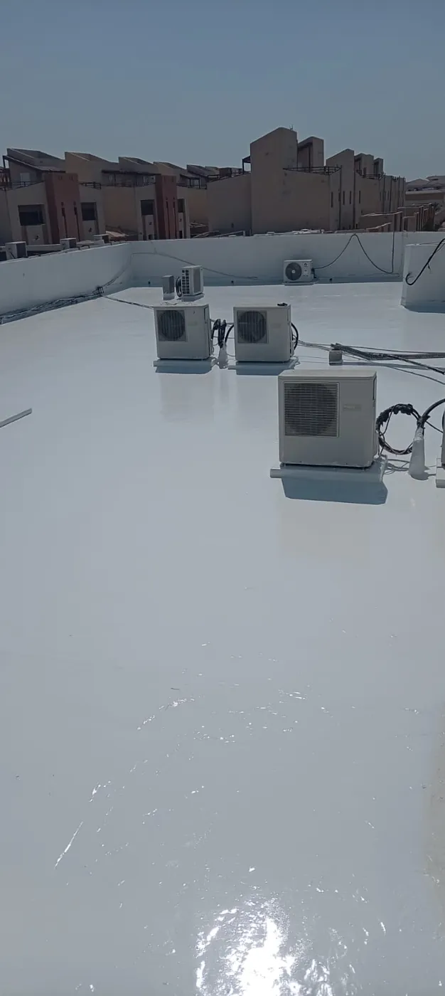 Completed roof: Continuous coating around rooftop equipment.