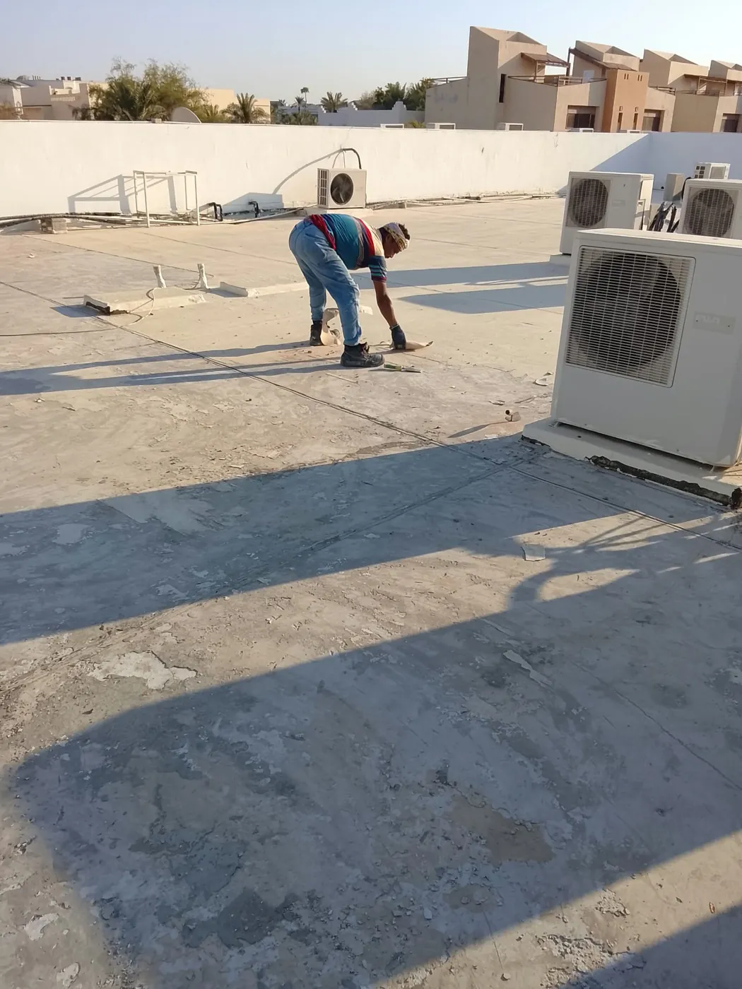 Surface preparation: Cleaning and checking joints before the new system is applied.